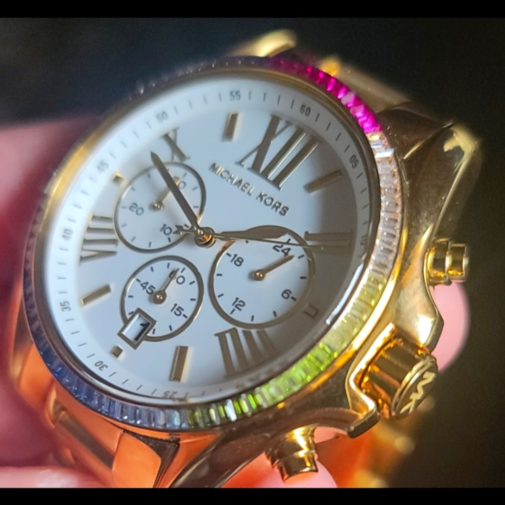 Michael Kors Bradshaw watch with rainbow bezel.